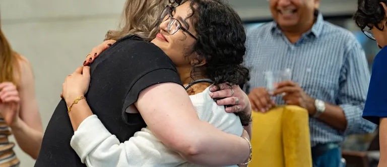 Hug at IC Graduation 2024
